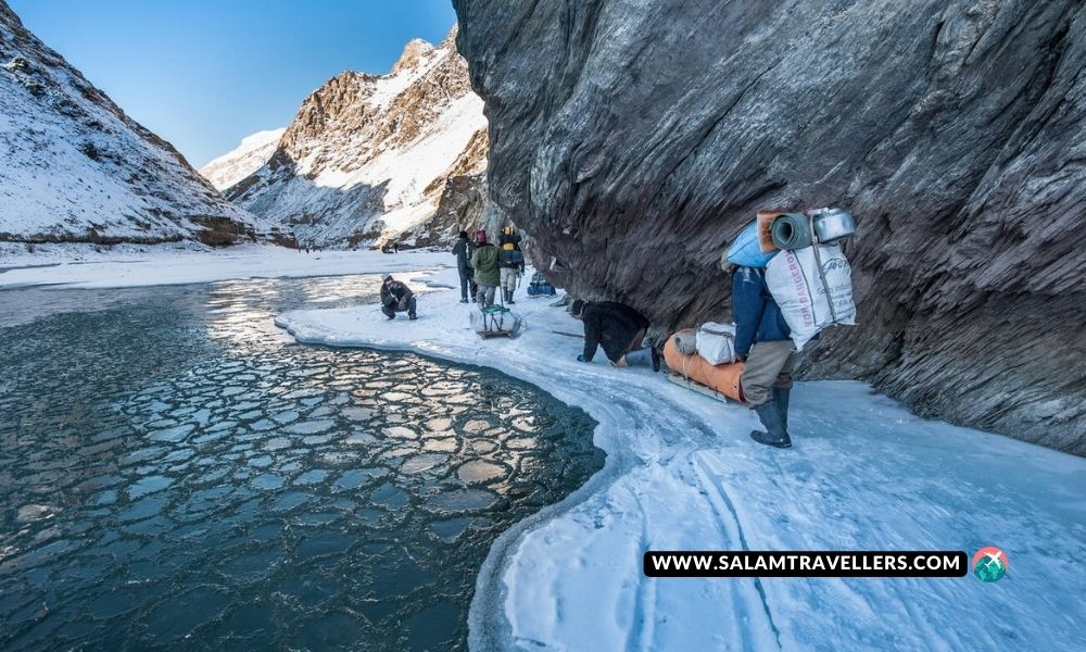 Walking on edge of the frozen Zanskar River - Salam Travellers